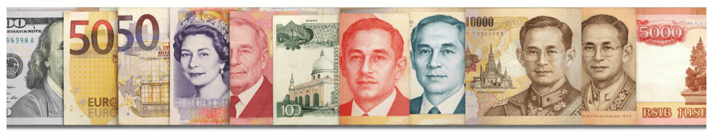 A spread of global currency banknotes including USD, EUR, GBP and more